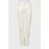 White trousers with tag