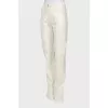 White trousers with tag