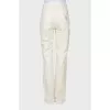 White trousers with tag