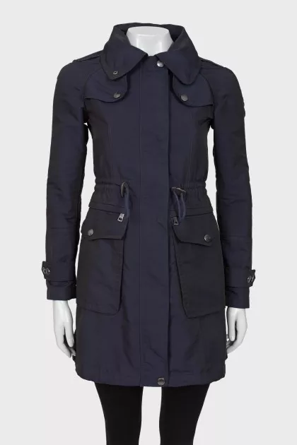 Blue raincoat with pockets
