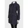 Blue raincoat with pockets