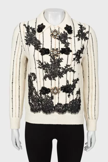 Decorated striped sweater