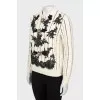 Decorated striped sweater