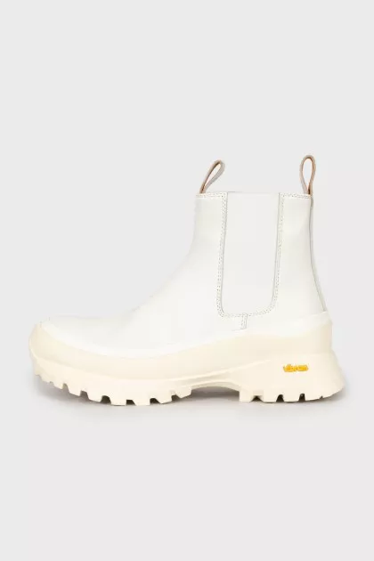 White boots with chunky soles