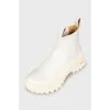White boots with chunky soles