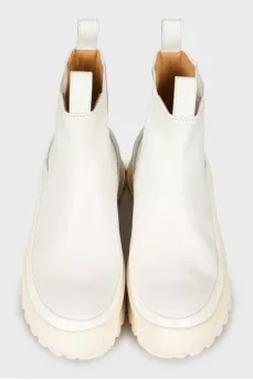 White boots with chunky soles
