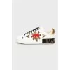 Decorated leather sneakers