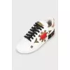 Decorated leather sneakers