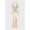 Beige dress decorated with sequins