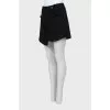 Tweed short skirt with brooch