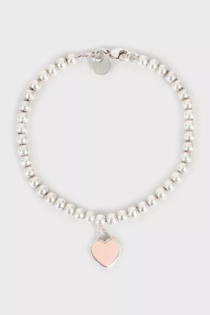 Silver bracelet with heart pendant
