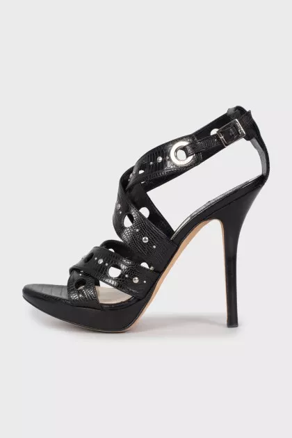 Black sandals with embossed leather