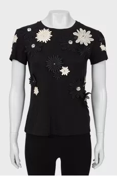 Black T-shirt decorated with flowers