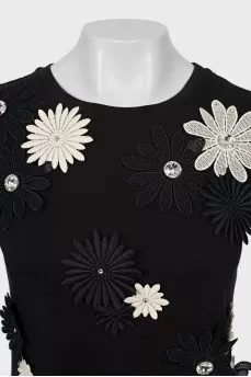 Black T-shirt decorated with flowers