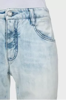 Light blue jeans decorated with sequins