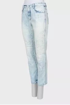 Light blue jeans decorated with sequins