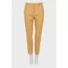 Linen trousers with stitched creases