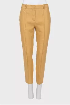 Linen trousers with stitched creases