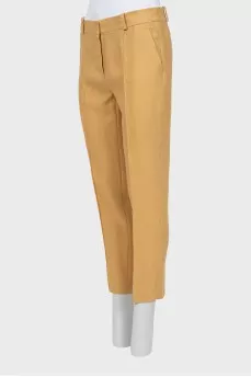 Linen trousers with stitched creases