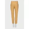 Linen trousers with stitched creases