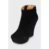 Suede ankle boots with shaped wedge