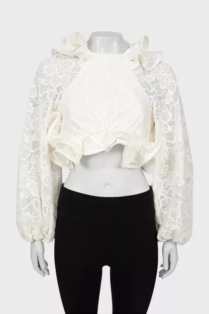 Lace blouse with voluminous sleeves
