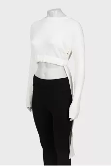White sweater elongated at the back