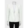 Fitted jacket with zippers on the sleeves