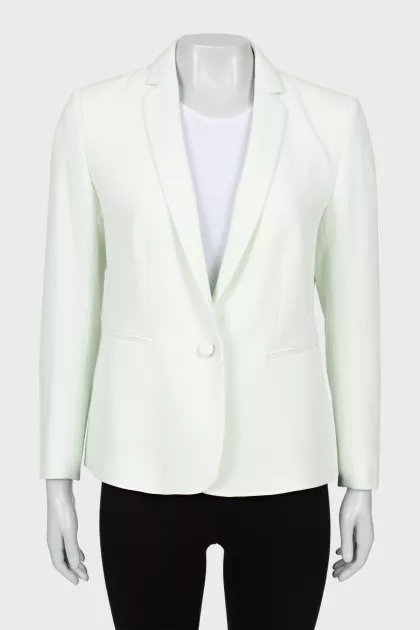 Fitted jacket with zippers on the sleeves