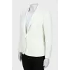 Fitted jacket with zippers on the sleeves