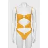 Yellow swimsuit with tag