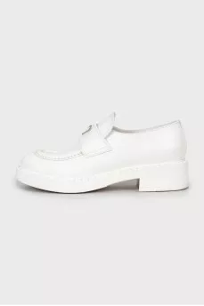 White leather loafers