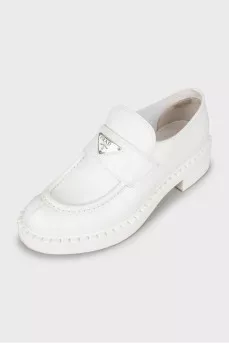 White leather loafers