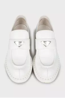 White leather loafers