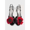 Textile sandals decorated with flowers