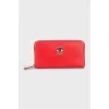 Red leather wallet with tag