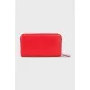 Red leather wallet with tag
