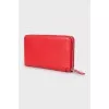 Red leather wallet with tag
