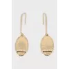 Gold-tone drop earrings with a pattern