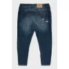 Dark blue distressed jeans