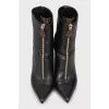 Leather ankle boots with signature print