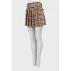 Pleated wool miniskirt