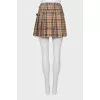 Pleated wool miniskirt