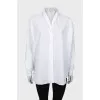 White shirt with knitted sleeves
