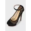 Perforated suede shoes