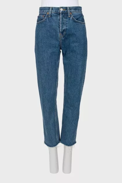 Blue jeans with raw hem