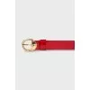 Patent leather belt with signature embossing