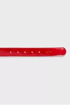 Patent leather belt with signature embossing