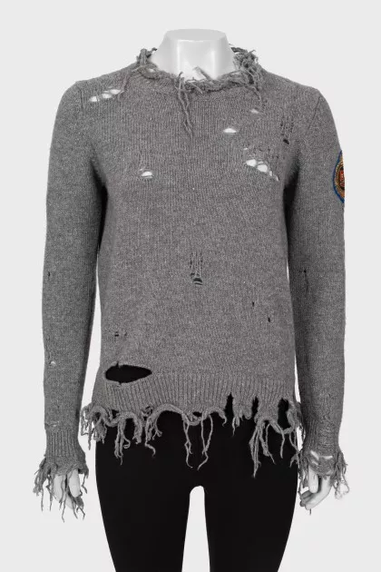 Ripped wool sweater