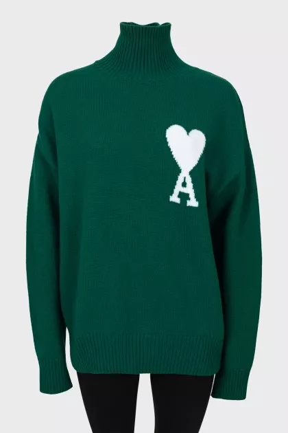 Knitted green wool sweater